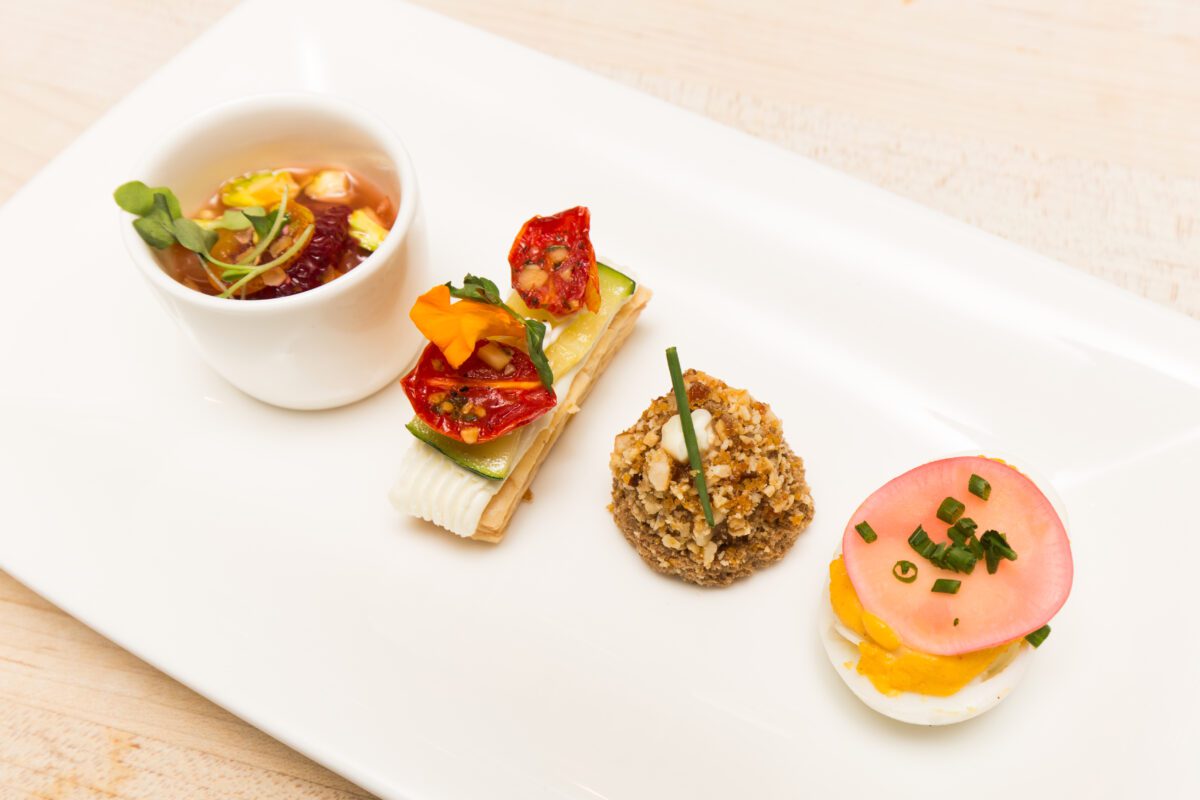 Hors d'OeuvreCitrus Salad with Lemongrass BrothBlue Crab Deviled Egg with Crab Roe Mayonnaise, Maryland Blue Crab, and Pickled RadishesChicken Liver Mousse on Caramelized ToastZucchini with Eggpla